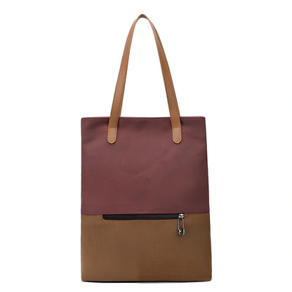 Canvas tote bag in black converts to backpack, 30x10x39cm size with zipper and polyester lining