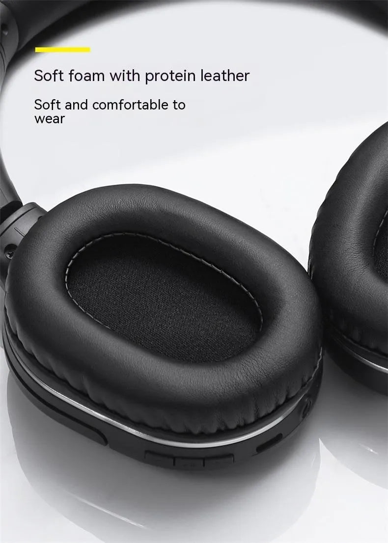Black and white wireless Bluetooth gaming headset with sports design showing ear cushions and adjustable headband