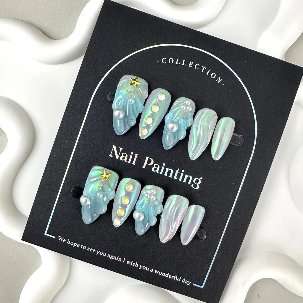 Blue plastic shell-shaped artificial nail stickers in four sizes XS S M L