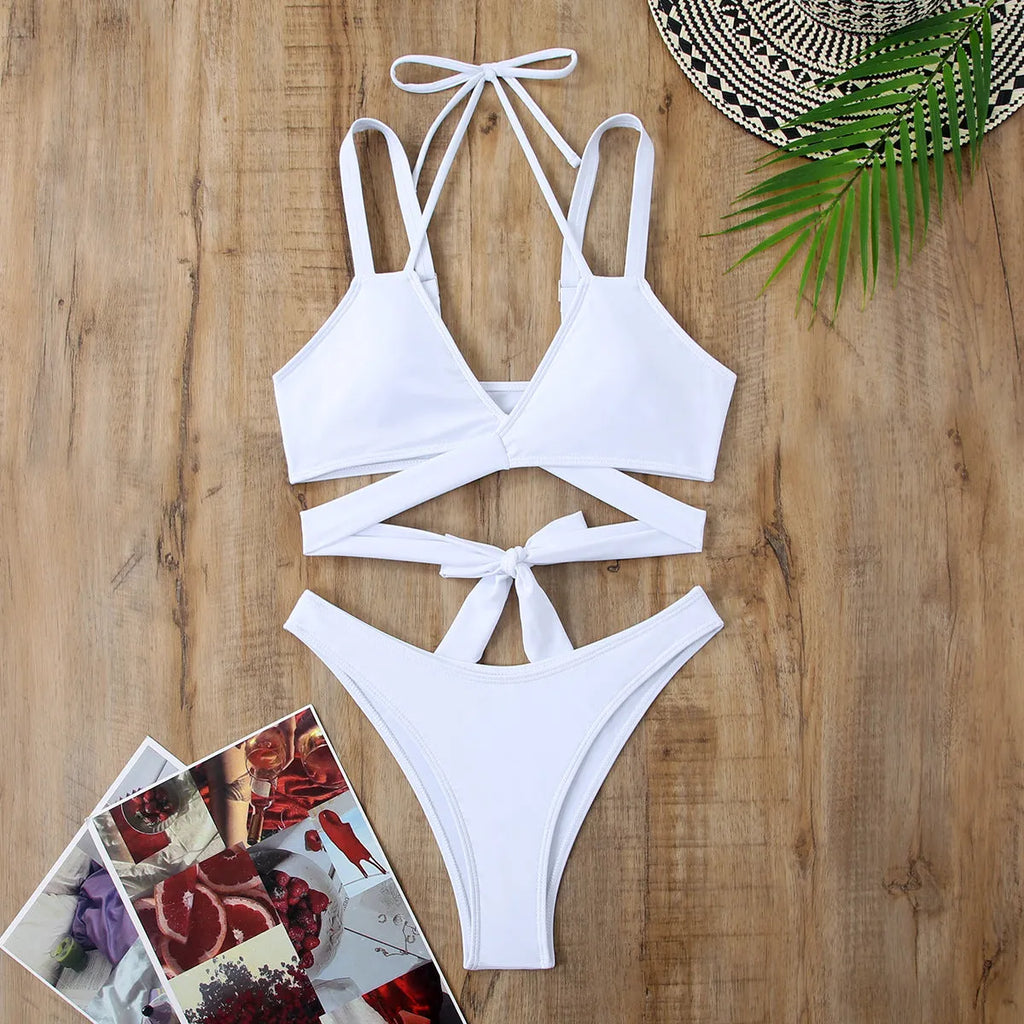 Strapless solid colour women's bikini swimsuit in briefs style, shown in red.