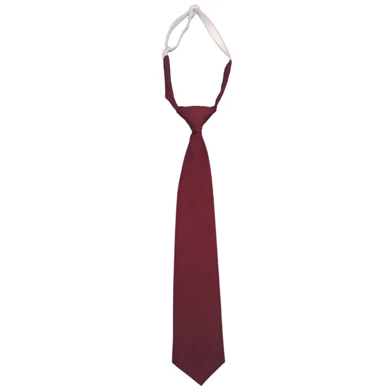 Men's solid navy blue cotton bow tie with arrow style ends on a white background.