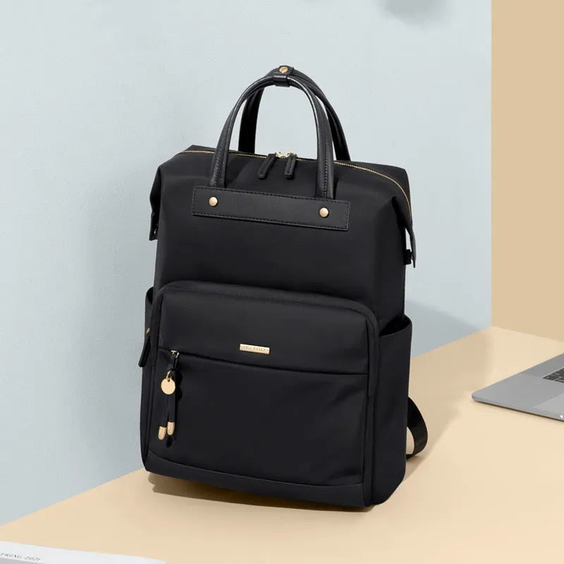Large fabric backpack for women with synthetic leather trim, shown in apricot colour with adjustable straps.