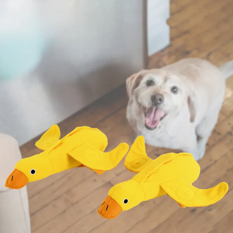 Yellow teddy dog toy with duck doll attachment for training with sounds and food leaks