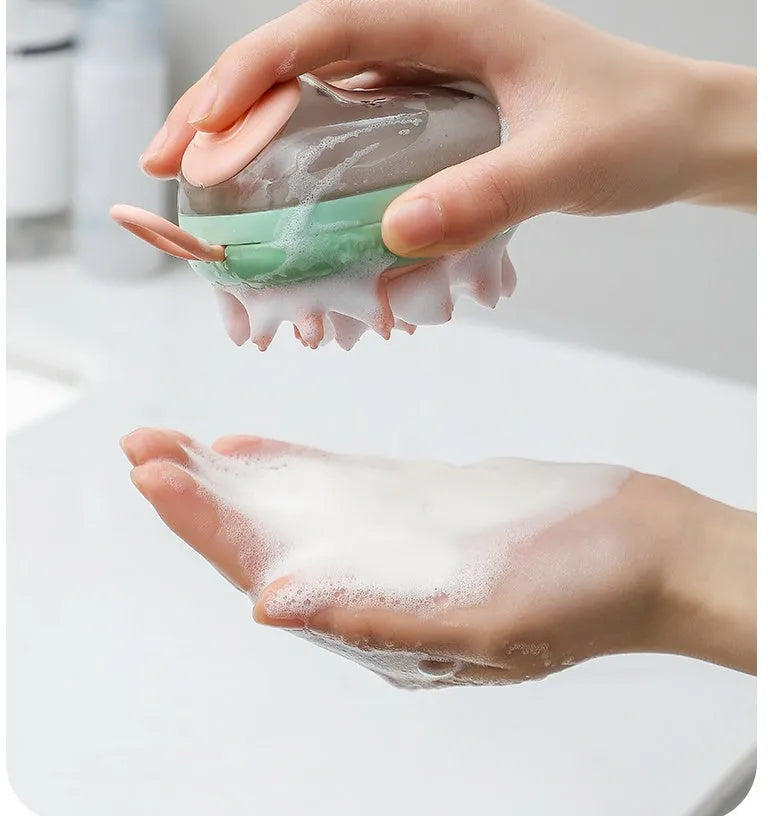 Blue pet bathing brush with shampoo dispenser and silicone bristles for cats and dogs