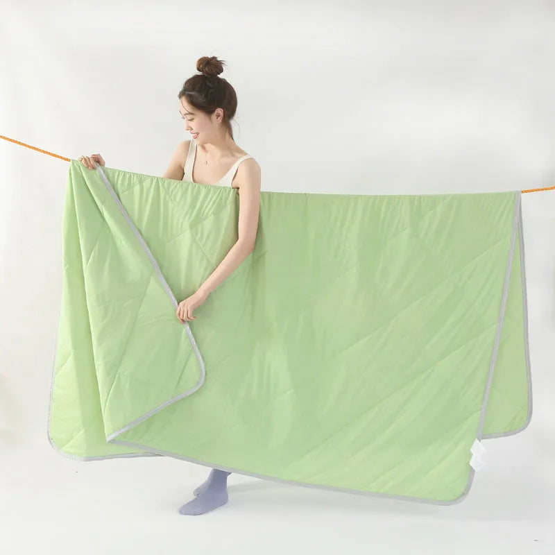 Class A Cool Silk Watermelon Quilt in cool fibre fabric with polyester filler, available in solid colours and multiple sizes