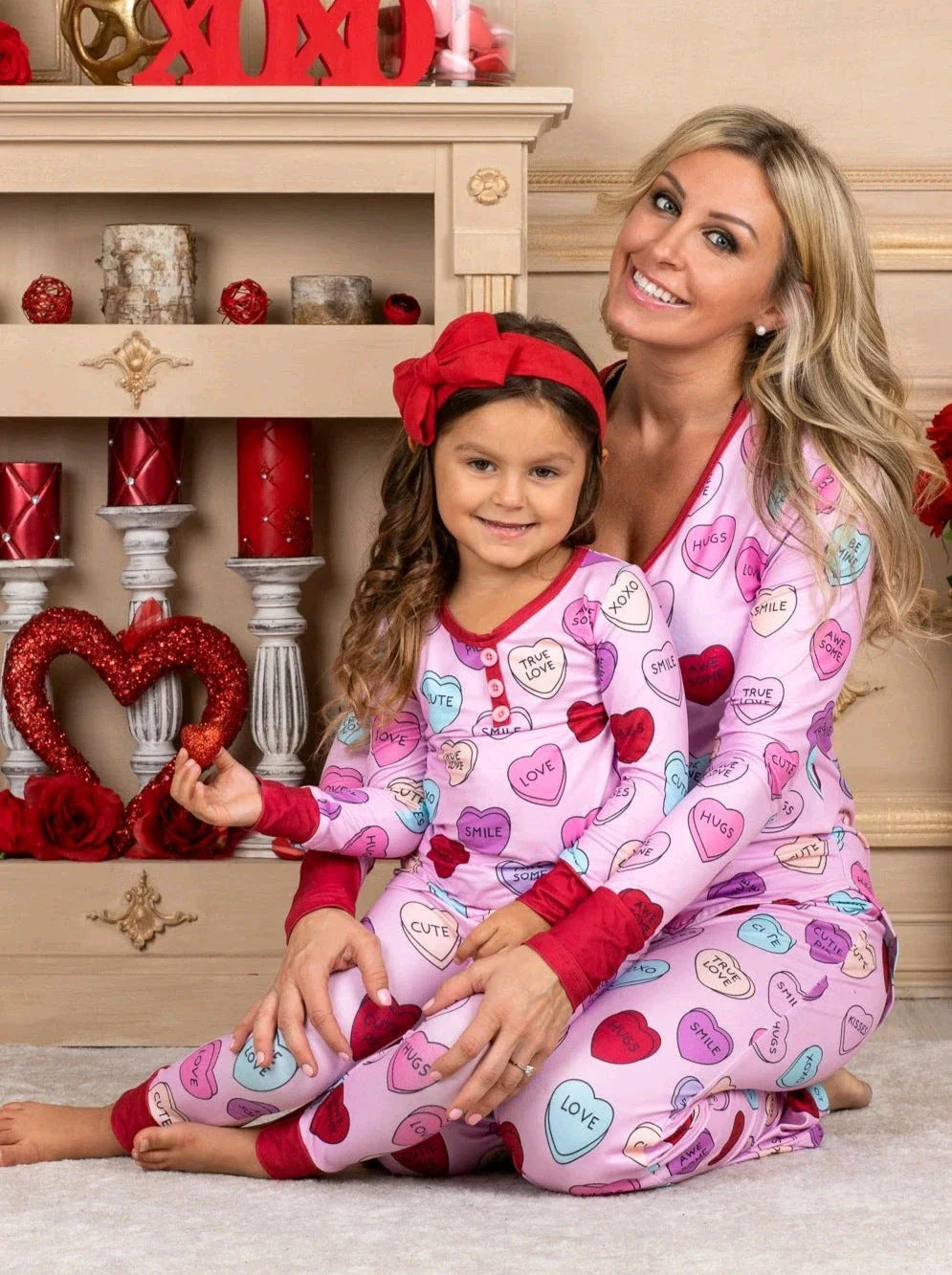 Valentines Day family pajamas with a cozy heart print design for parents and children