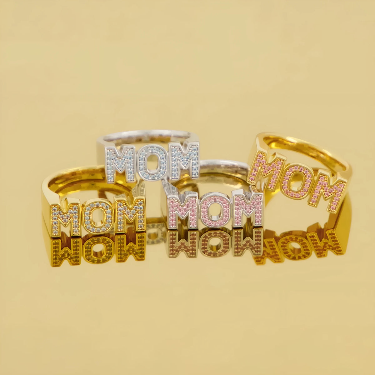 Copper open mouth ring with electroplated finish, six colour options including pink diamond gold and blue diamond silver, letter motif