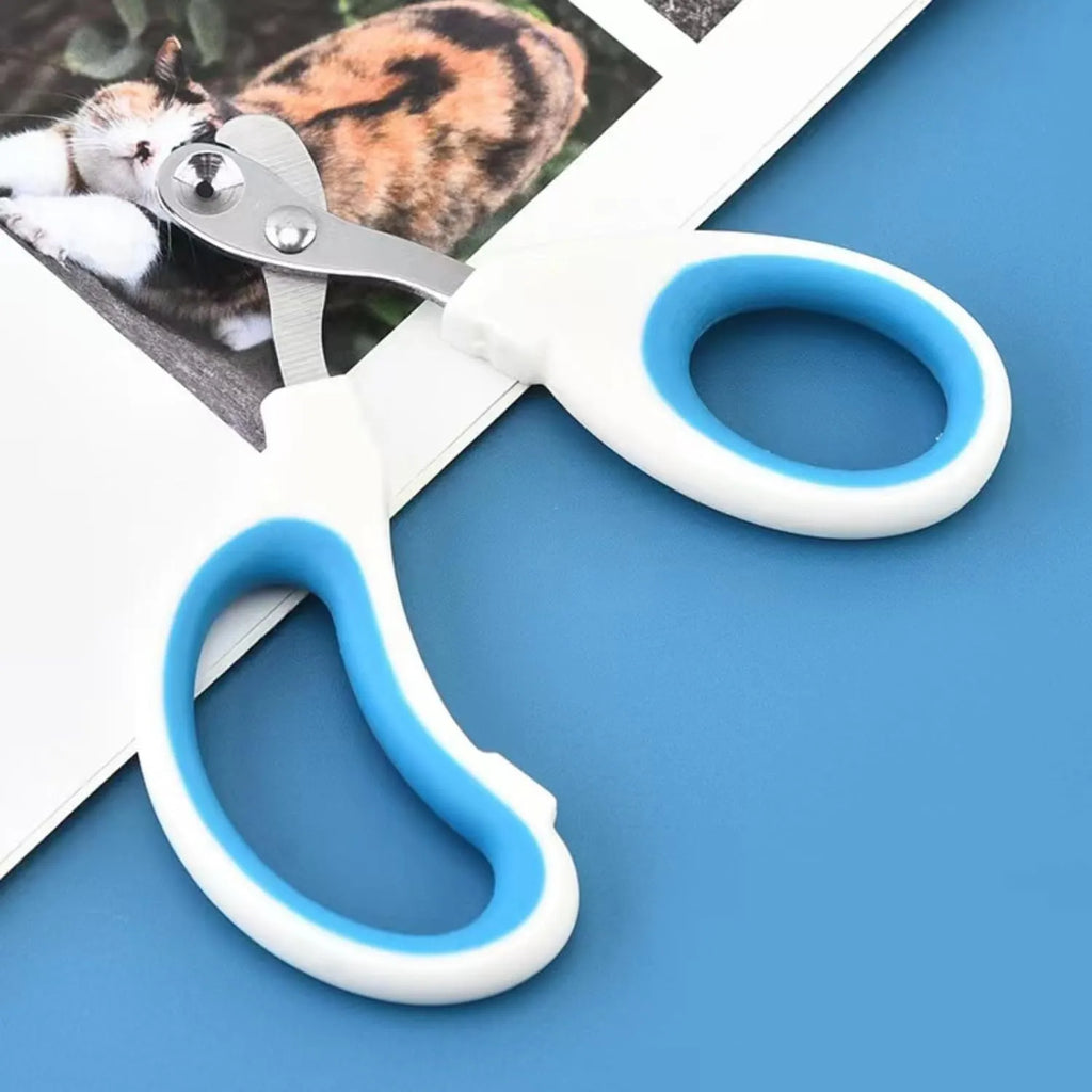 Blue pet nail clipper with circular cut hole and cushioned non-slip handle