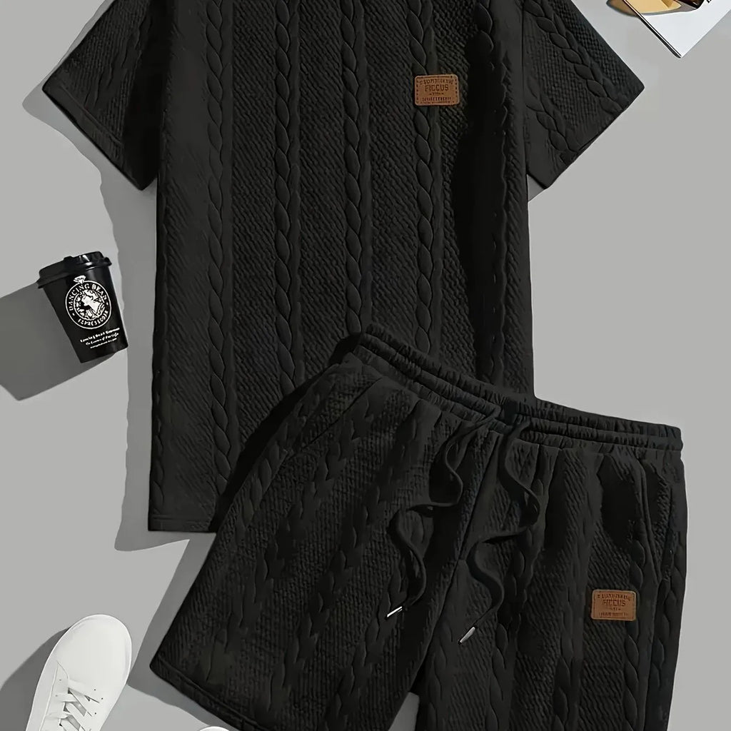 Men's black sports two-piece set with ribbed short sleeves and matching shorts