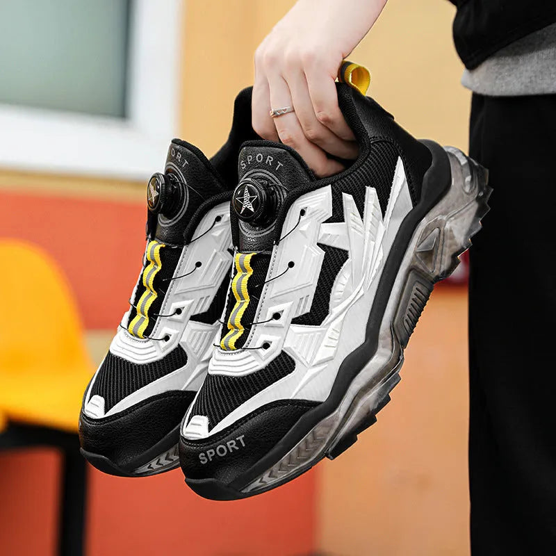 Men's black casual dad shoes with rotating button fastening and mesh upper