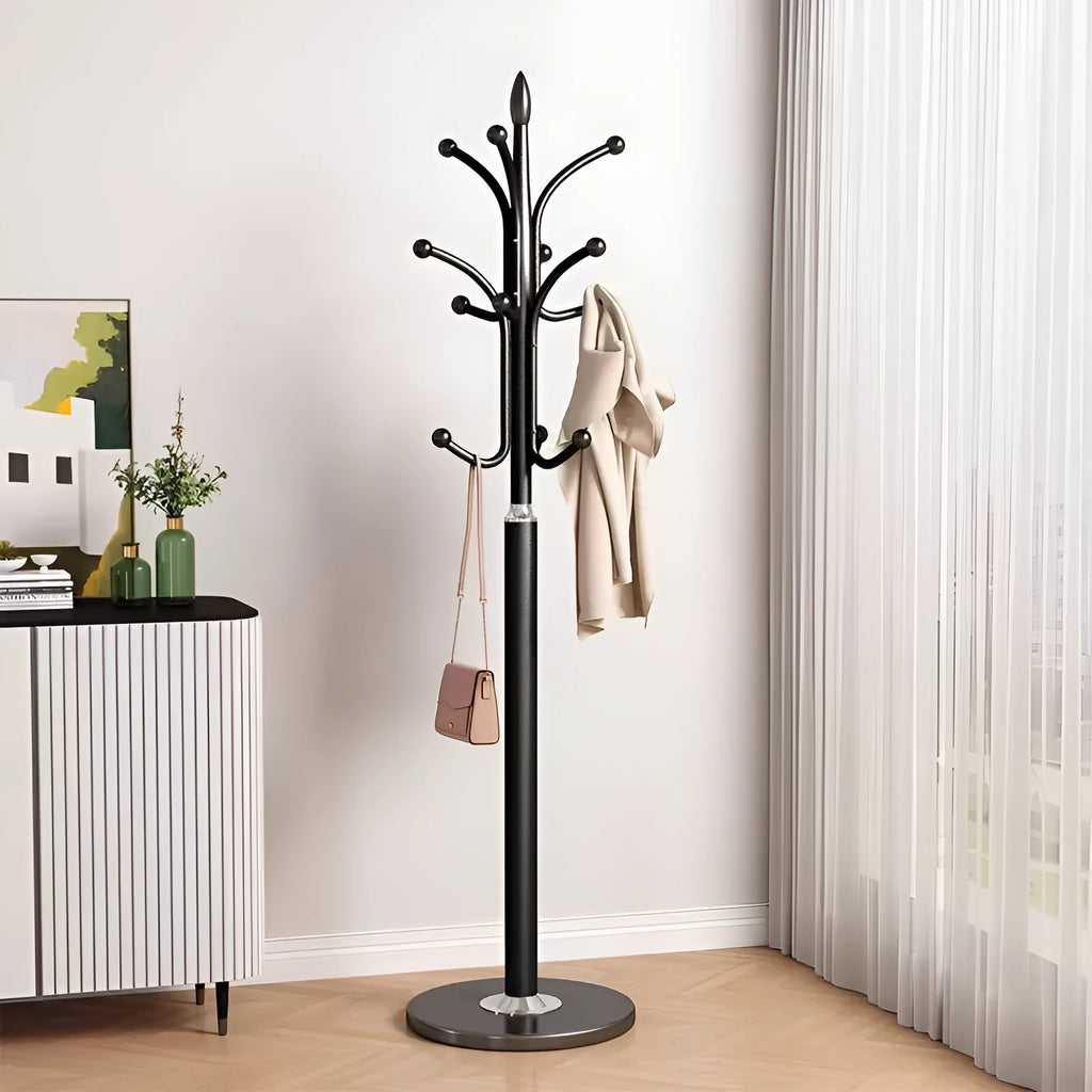 Floor-standing metal coat rack in black, vertical design for bedroom use, simple iron frame