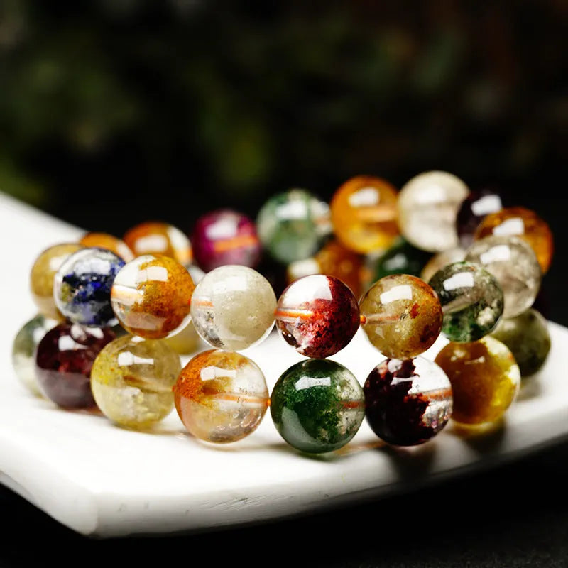 Ethnic style crystal ball bracelet with colourful ghost cornucopia design on 10mm beads.