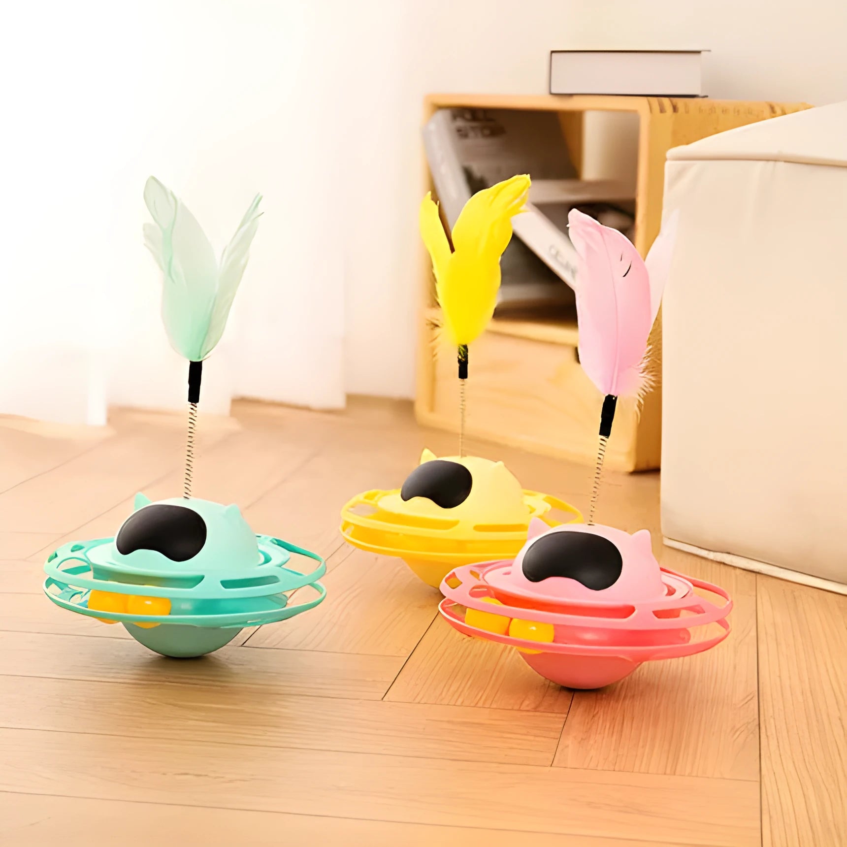 Pink cat tumbler turntable toy measuring 17 cm by 10 cm on a flat surface