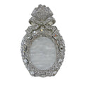 Golden women's hard shell clutch bag covered in sparkling diamonds for formal events.