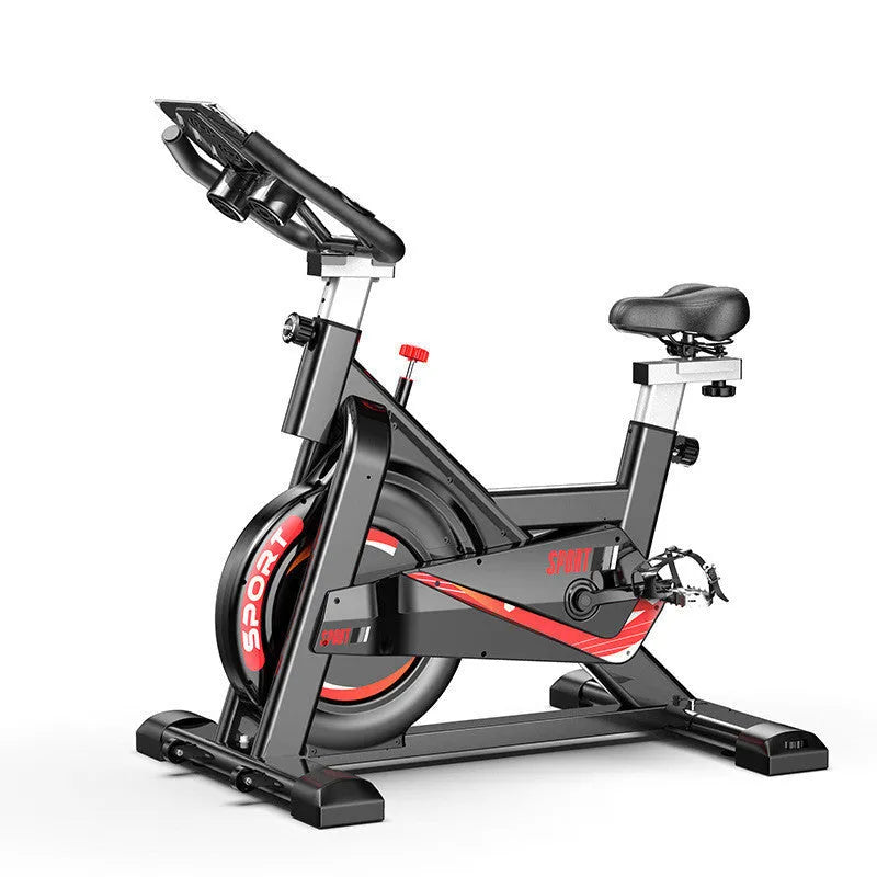 Black upright spinning bike with padded saddle and handlebars for home fitness