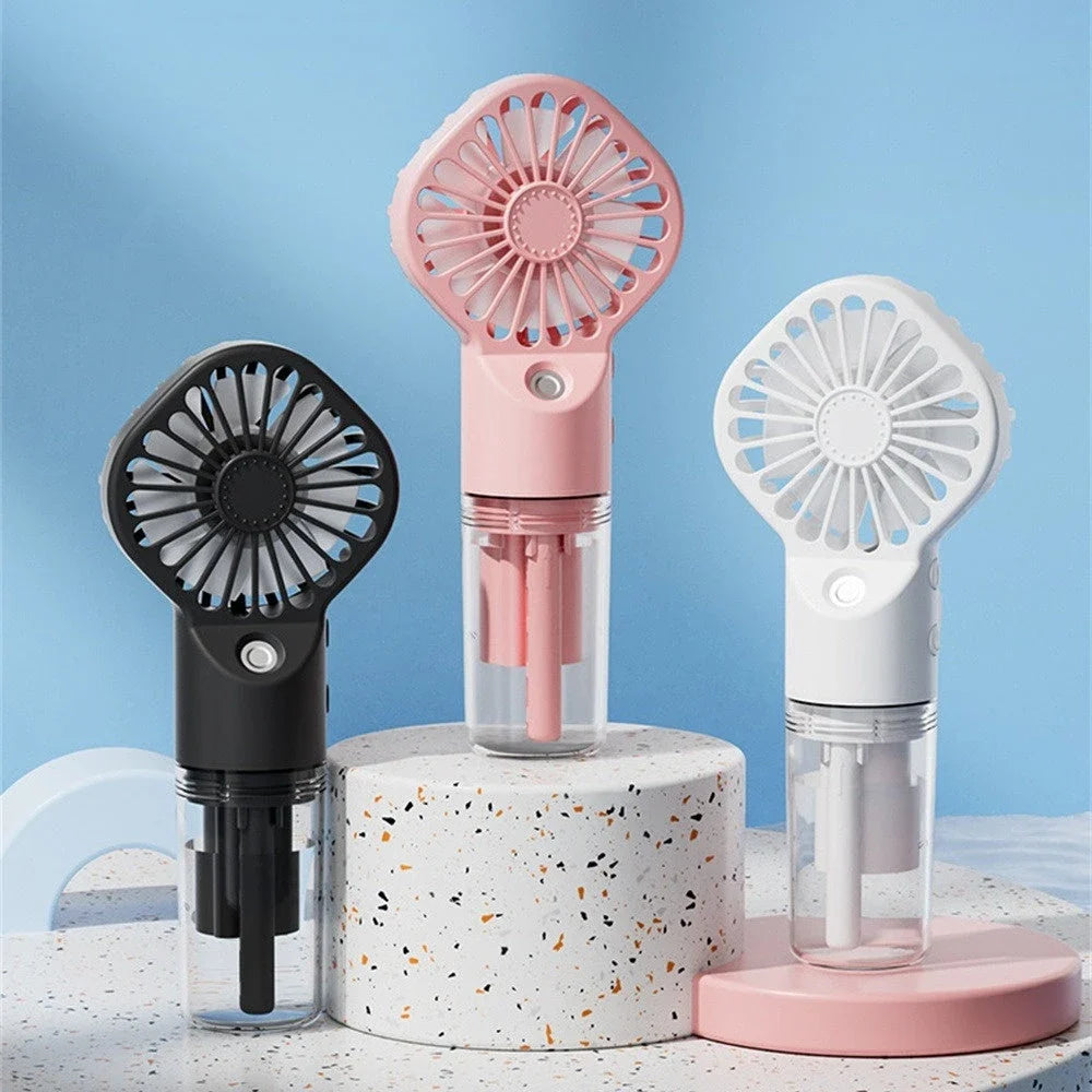 Powerful mini fan with mist humidification feature, delivering icy-cool, hydrating airflow for refreshing comfort