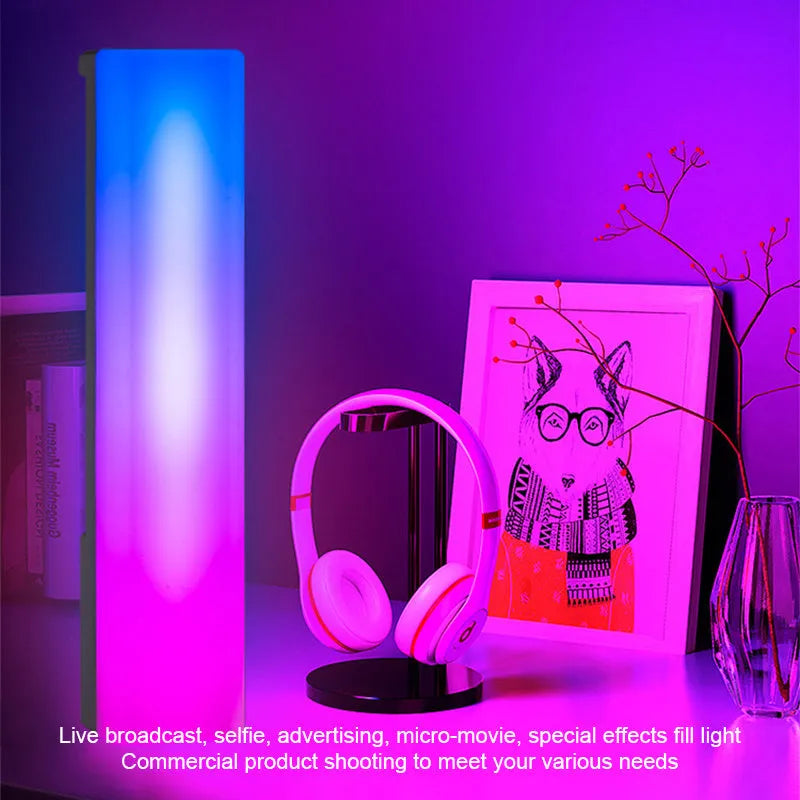 3D RGB voice-activated ambience lamp in black or white on a gaming desk.