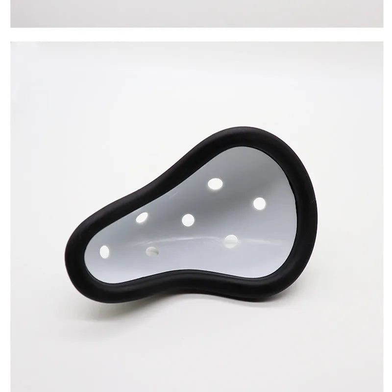 Black rubber sports genital protector for adult and child sizes used in hockey, rugby, and martial arts.