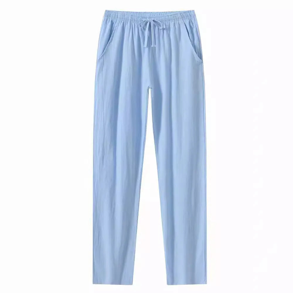 Men's cotton linen beach trousers in loose casual fit showing four colour options with European size labels