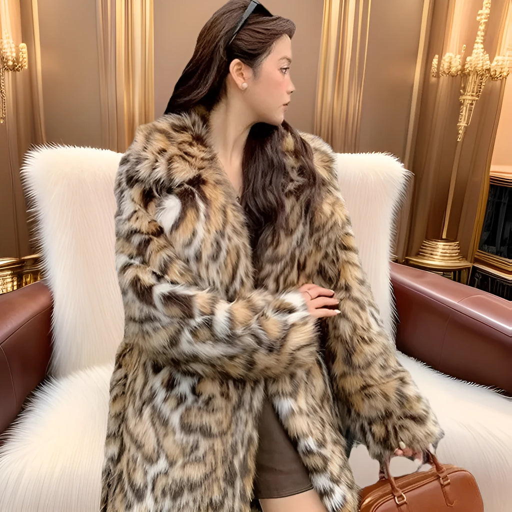 Faux fur street fashion coat with fur collar in long style with regular sleeves and pockets