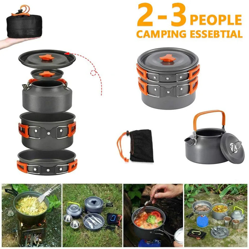 Orange folding camping cookware set with pots, pan, spoons, bowls in mesh bag on outdoor table