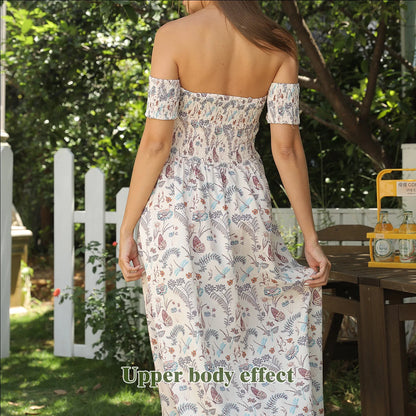 Women's off-shoulder strapless floral dress in a vibrant pattern, perfect for summer outings.