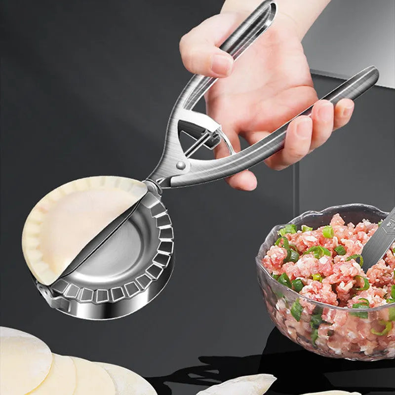 Silver stainless steel manual dumpling maker press for homemade dumplings and filled pastries