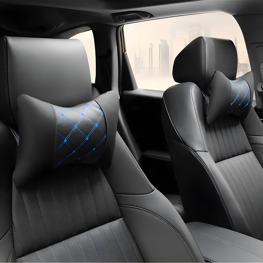 Black diamond quilted car headrest pillow with contrast stitching for neck support.