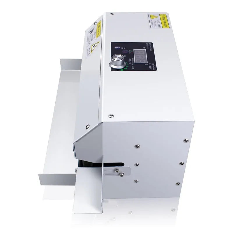 Silver household portable aluminium foil bag sealing machine with three specification options on a kitchen counter