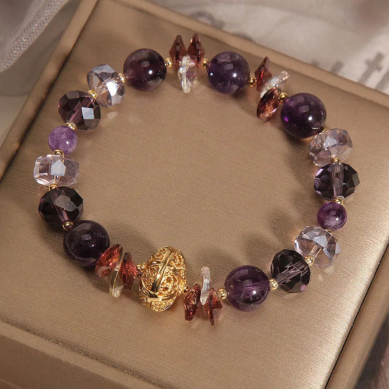 Purple crystal bracelet with pumpkin lucky beads and rhinestone wind chimes design for women.