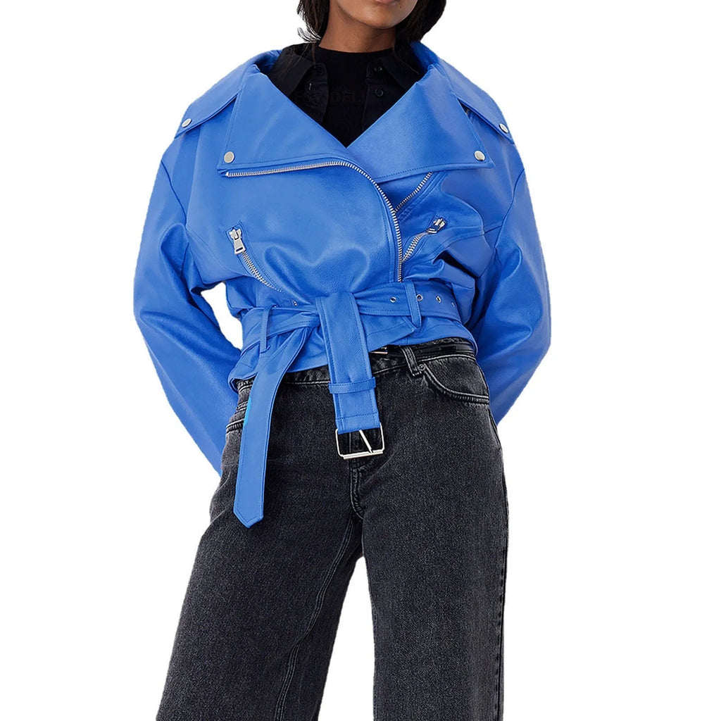 Punk style short jacket with Peter Pan collar and drawstring waist in black leather-look fabric.