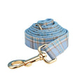Sky blue grid patterned dog collar, leash, vest, and bow set from the forest series for pets.