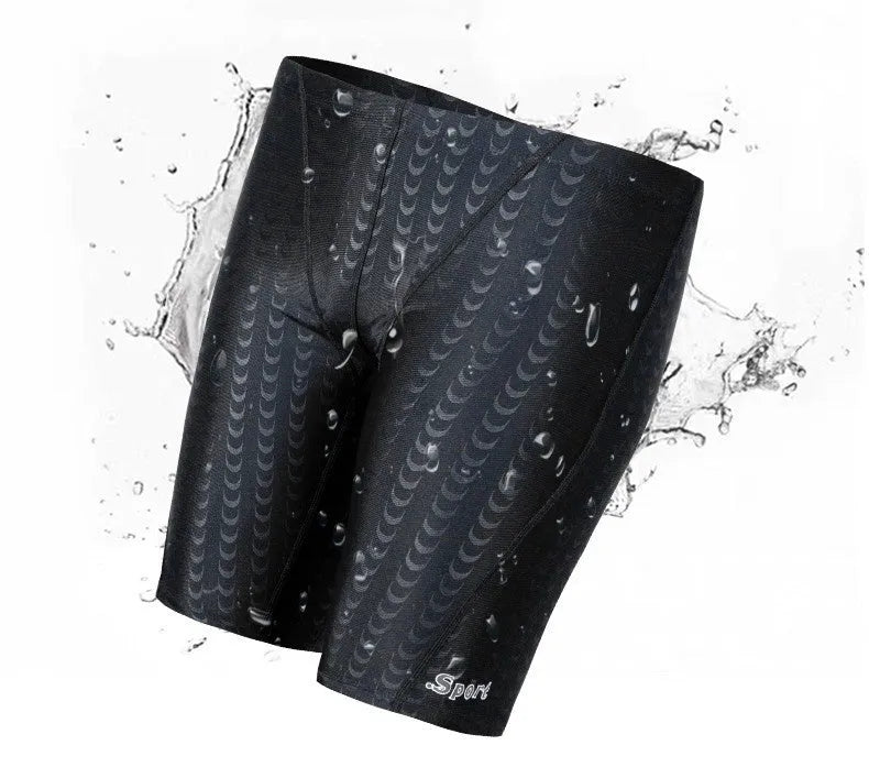 Men's solid colour polyester swimming trunks for surfing and beach use in sizes XL to 4XL