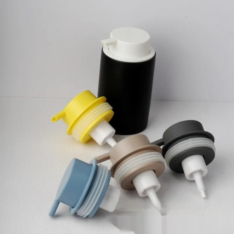 Large pump head facial cleanser foam dispenser in metallic finish