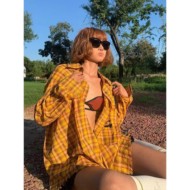 Dopamine yellow American plaid shirt with loose fit on hanger.