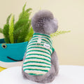 Thickened striped bear pet top in polar fluff, green colour, showing front view on a small dog