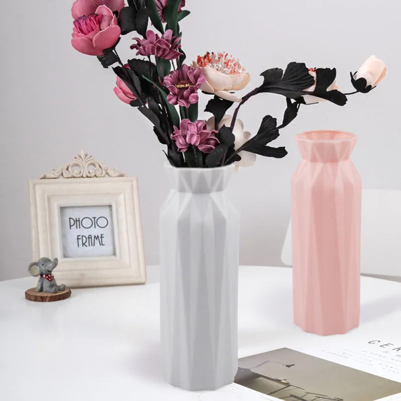 A sturdy green melamine vase with a wide 7.2cm base on a wooden surface.