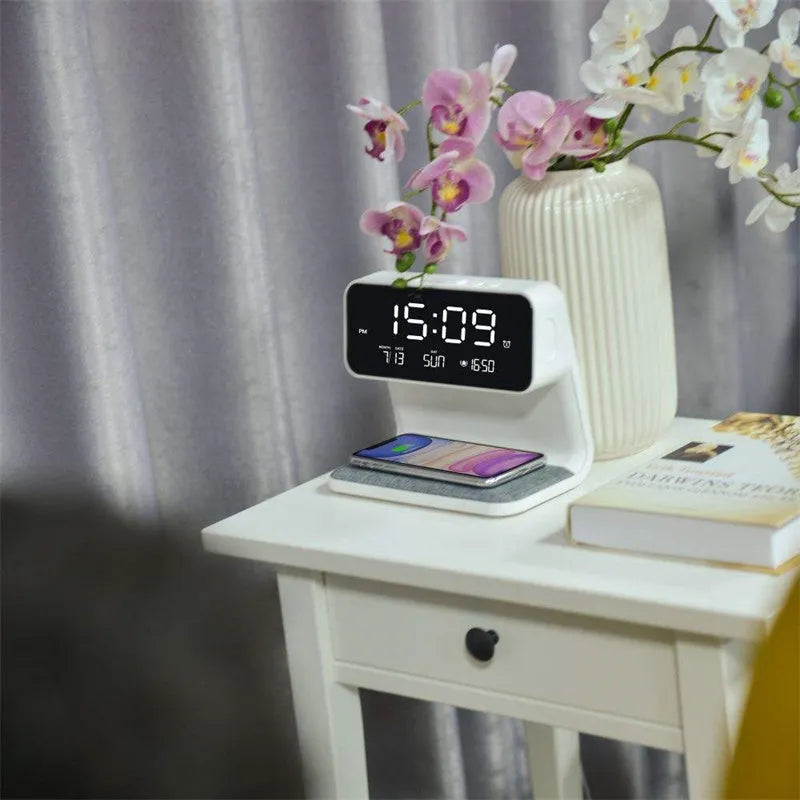 White 3-in-1 bedside lamp with wireless charging pad, LCD alarm clock screen, and touch-sensitive dimming control.