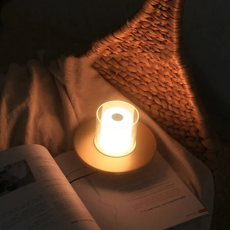 Bar table lamp candle light gold finish with warm glow on a table