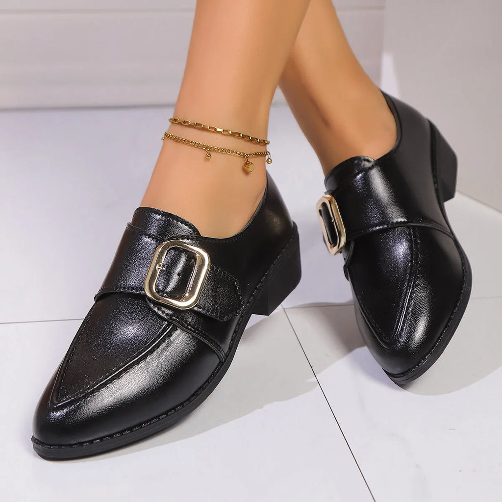 Women's pointed toe PU leather shoes with a bow detail on the upper.