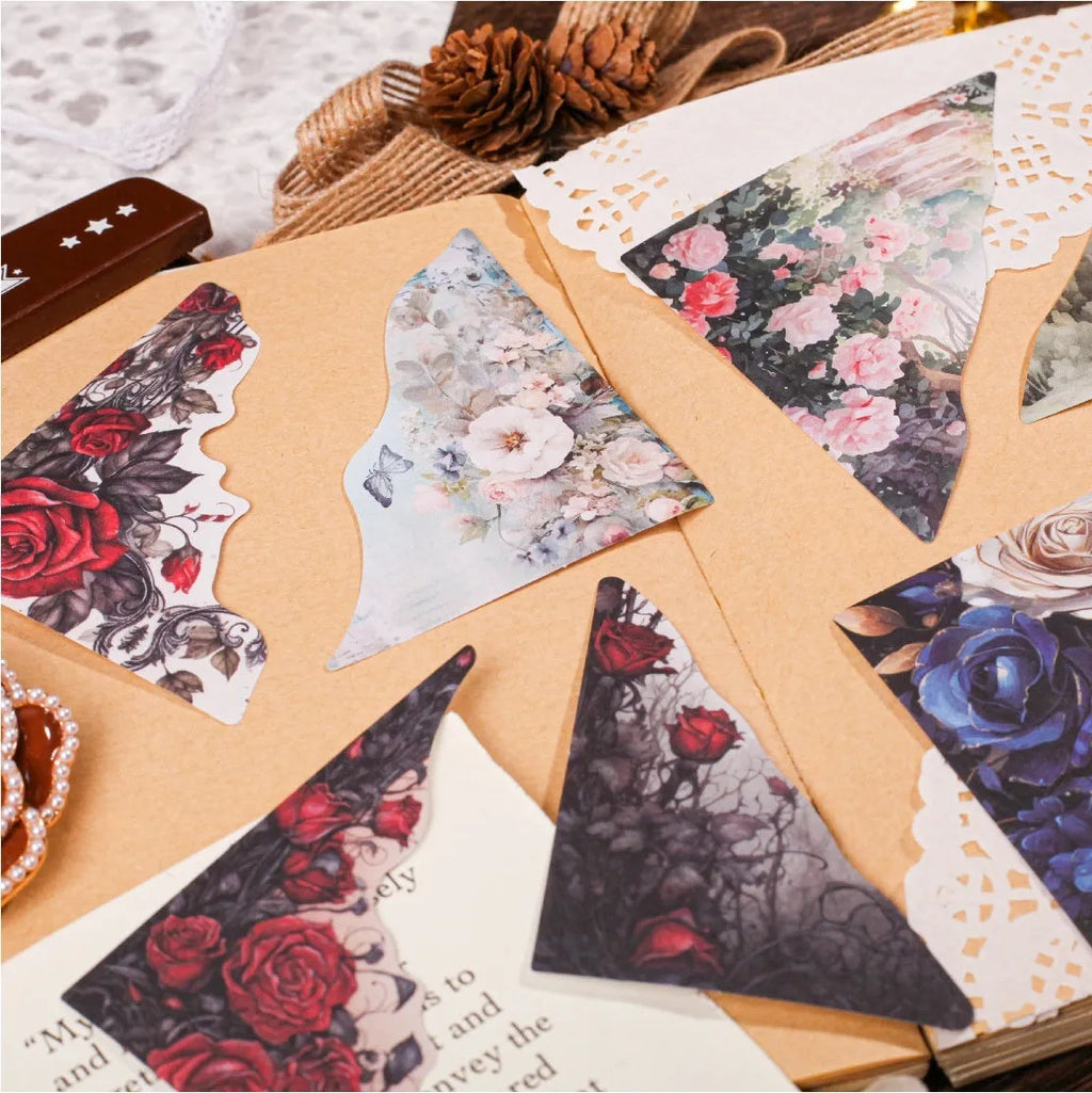 Pack of printed paper notecards in six colours showing spring vine, pink plum, red rose, blue, green wild, and purple dew designs.