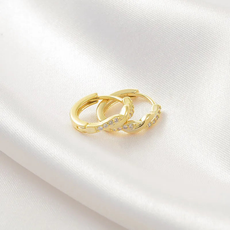 Gold and silver geometry-shaped interwoven hemp rope earclip earrings for women.