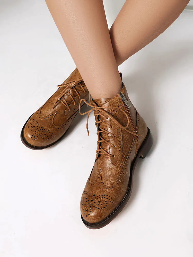 Women's chunky heel black classic boots with pointed toe, leather lining, and ethnic pattern