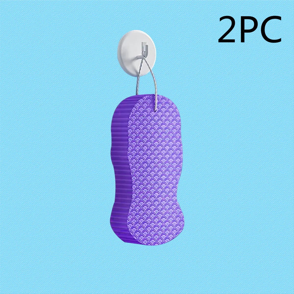 White 3D fish scale pattern bath sponge ball on a bathroom surface.