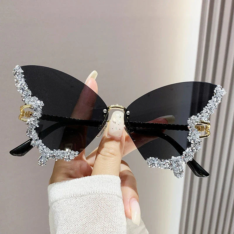Luxury diamond-studded butterfly sunglasses in various gradient color options, featuring a vintage-inspired design and high-quality materials for a fashionable and glamorous look.