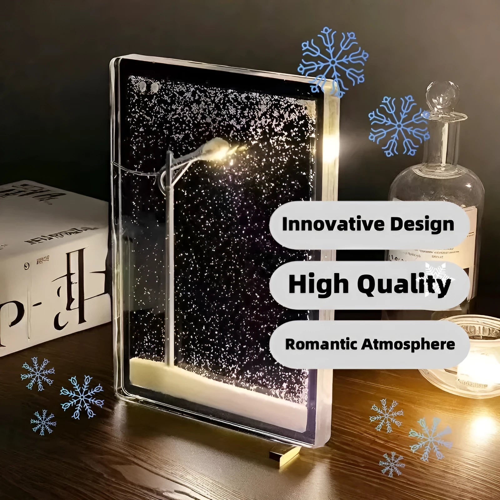 DIY snowy night light kit showing a small assembled street lamp with LED lights on a snowy flowing water landscape