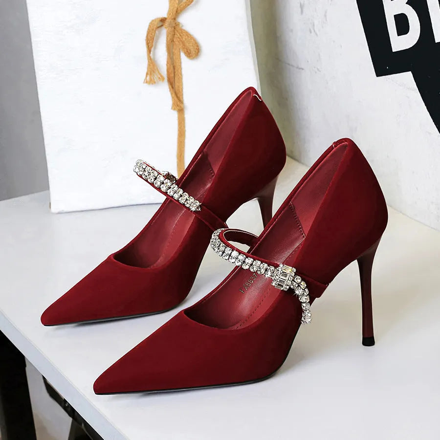 Pointed toe suede stiletto heels with rhinestone strap in black, shallow vamp design