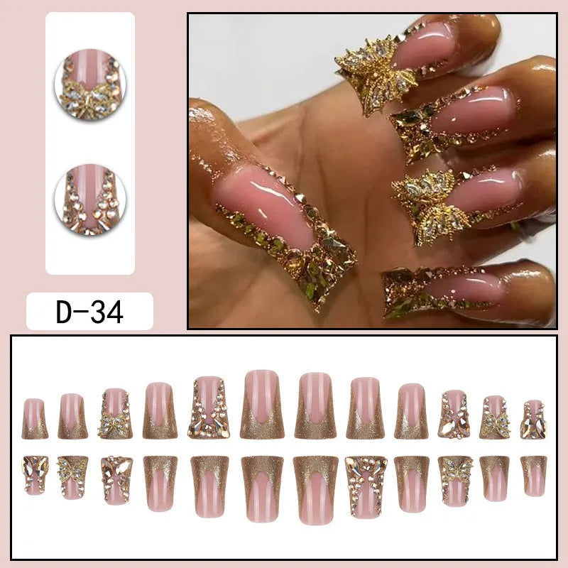 Golden diamond and butterfly design nail stickers on nails with debris texture, part of a 24-piece DIY kit.