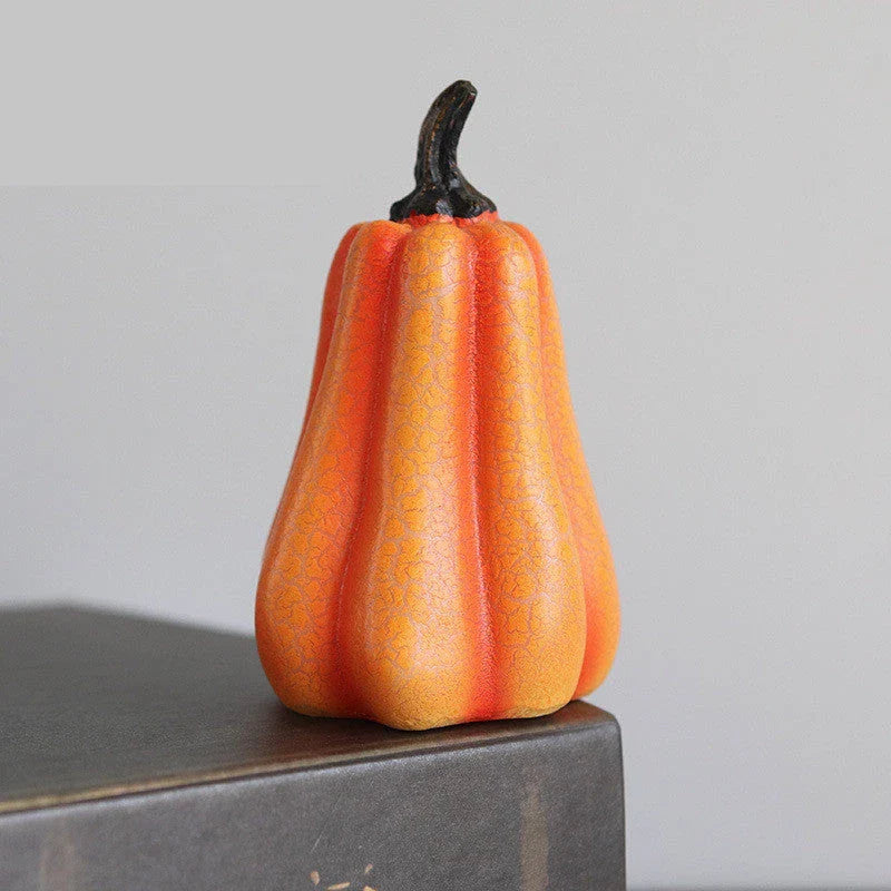 Realistic resin pumpkin lantern with LED lights, perfect for Halloween decor and celebrations