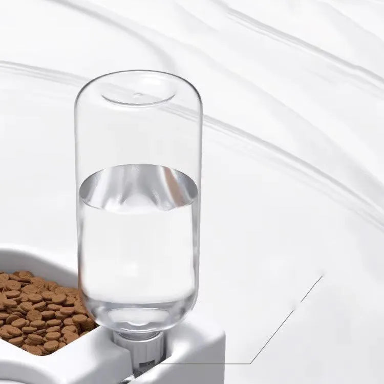 White cat water fountain with flower-shaped top and LED light on a kitchen counter